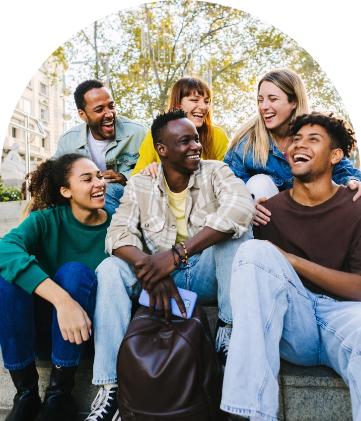 Friends laughing together outdoors