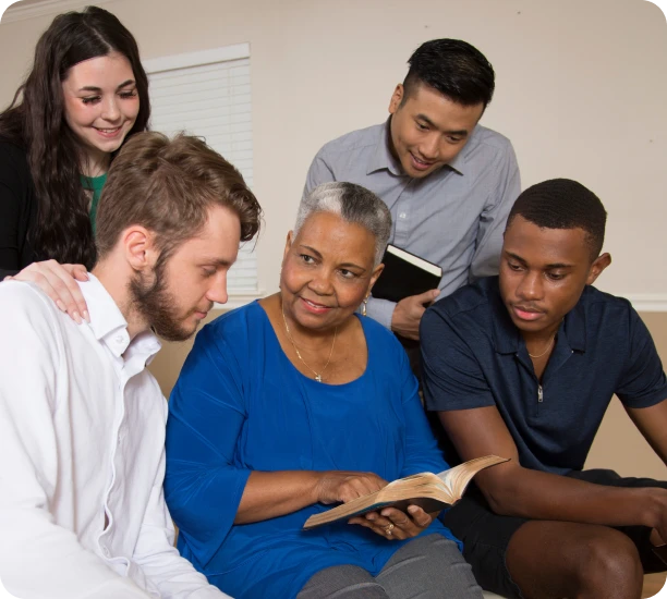 Group reading a book together